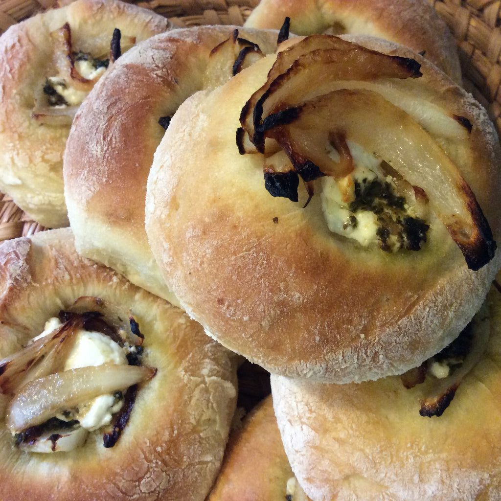 GOAT CHEESE & ONION BIALY